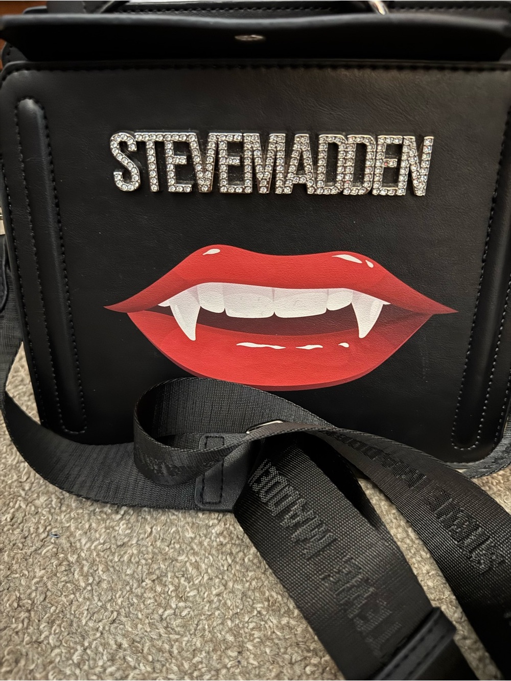Steve Madden Black Crossbody Bag with Red Vamp Lip Accent